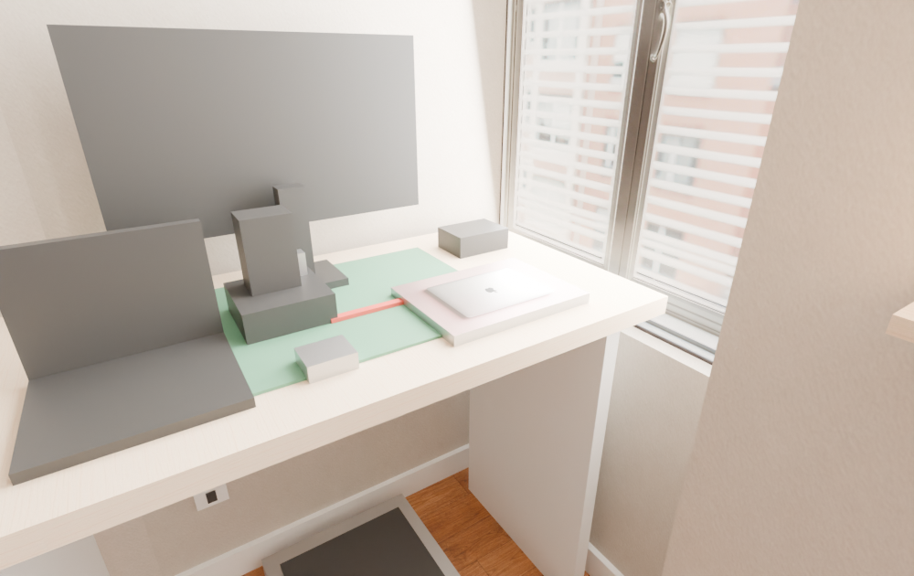 Desk with textured MacBook lid