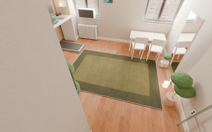 Cylinder bordered olive wool rug in the studio