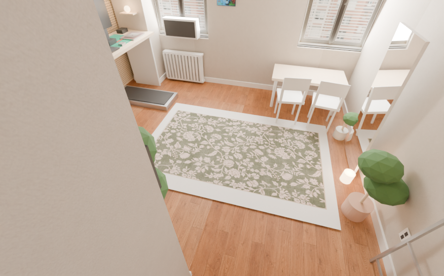 Brenna olive floral rug in the studio